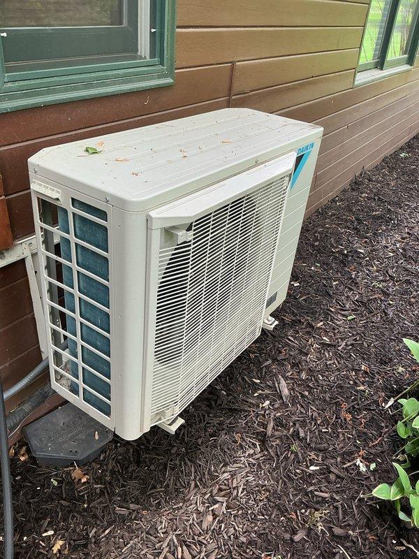 Completed preventive maintenance tune-up on 6-year-old 3-ton air conditioning system under maintenance agreement. Customer reported unit not keeping up during peak summer heat; performed comprehensive system evaluation including refrigerant charge verification, airflow measurements, and component inspection. Confirmed blower fan speed at 1200 CFM and proper refrigerant charge levels. Determined cooling capacity limitations stem from inadequate return air ductwork design in log home construction rather than equipment malfunction. All system components operating within manufacturer specifications; no adjustments made to existing fan speed settings as they are optimized for current ductwork configuration.