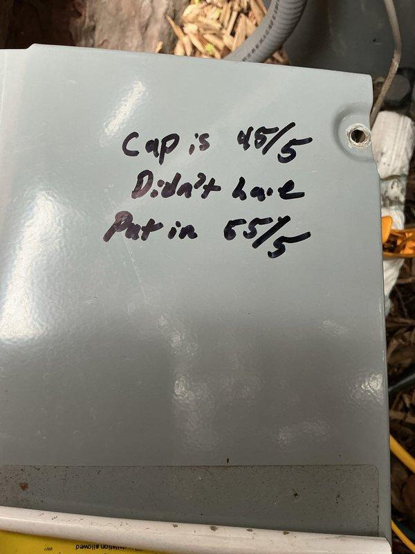 Responded to no cooling complaint on 5-year-old high velocity system. Performed system evaluation and measured refrigerant pressures using digital manifold gauges, obtaining readings of 984 PSIG low side and 1055 PSIG high side with 158°F superheat at outdoor temperature of 72°F. Confirmed cool air delivery from vents and determined refrigerant charge appears appropriate for current ambient conditions of 50°F outdoor temperature. Noted that accurate refrigerant charge verification on high velocity systems requires minimum 70°F outdoor ambient temperature for proper assessment. Documented previous capacitor substitution where 45/5 MFD unit was replaced with 55/5 MFD capacitor due to parts availability. Advised homeowner to operate system during warmer weather conditions and contact for follow-up evaluation if cooling issues persist when outdoor temperatures reach 70°F or above for accurate charge analysis.