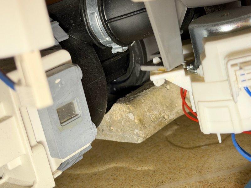 Responded to water leak originating from dishwasher area with water damage extending to basement ceiling. Upon inspection, identified failed dishwasher supply line as primary leak source. Replaced faulty supply line and conducted operational test of dishwasher unit. Testing revealed secondary leak from dishwasher motor assembly. Observed significant water damage and mold growth on surrounding floor and wall structures. Documented internal appliance conditions showing mineral buildup and component deterioration. Advised homeowner to contact restoration specialists and appliance replacement vendors for water damage remediation and dishwasher replacement due to failed motor component.