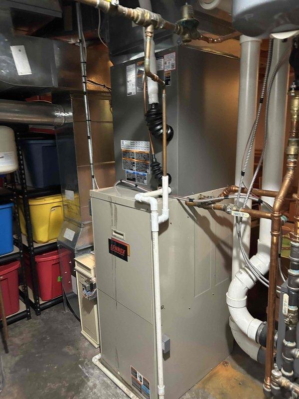 Completed preventive maintenance tune-up on one-year-old Lennox air conditioning system. Performed comprehensive inspection with all components operating within manufacturer specifications. Rinsed condenser coil, verified brand new air filter in place, and confirmed proper system performance with 25-degree temperature split across evaporator coil.