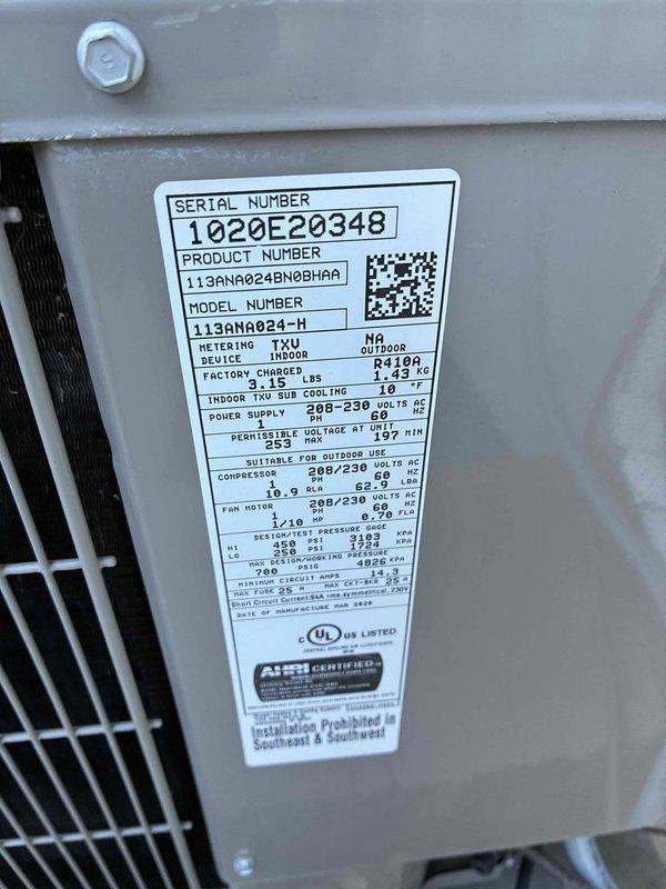Responded to no cooling complaint on 5-year-old system experiencing buzzing noise and lack of cold air. Found compressor not operating while condenser fan was running, with minimal airflow from outdoor unit. Diagnosed failed capacitor and severely plugged condenser coil. Replaced failed capacitor, performed condenser coil cleaning, and verified fan motor and contactor operation. Replaced plugged air filter and cleared condensate drain line. Verified system operation with 21-degree temperature differential across evaporator coil. Unit restored to proper cooling operation.