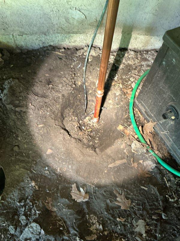 Supplied and installed 6 feet of copper waterline connecting to existing pressure vacuum breaker (PVB) and extended new line to existing underground irrigation system. Installed brass valve assembly with dual ball valves for shutoff control, utilizing soldered copper fittings and threaded brass adapters throughout the installation. Mounted plumbing assembly to wooden structural beams in basement area, ensuring proper support and alignment of all piping. Activated water supply to PVB and pressure tested all new fittings and connections to verify system integrity and confirm no leaks were present. All plumbing work completed in accordance with Minnesota Plumbing Code requirements. Installation includes one-year warranty coverage on all labor and parts.