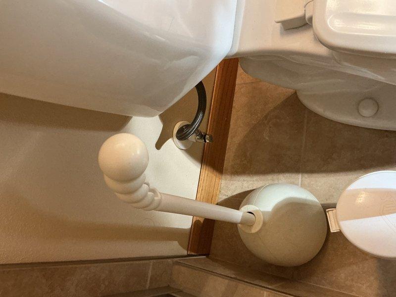 Completed annual plumbing inspection and maintenance on residential property. Replaced iron reduction cartridge in whole house filtration system due to significant plugging and reduced flow capacity. Inspected all visible plumbing fixtures including bathroom toilet, sink, and supply lines for leaks or deterioration. Verified proper operation of dual-tank water treatment system with digital control units and tested all connections. No leaks detected throughout the system. All plumbing fixtures and filtration equipment operating within normal parameters.