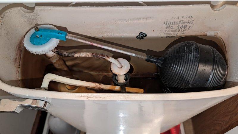 Responded to a toilet issue in the main floor bathroom where an old-style fill valve was failing to shut off properly, causing continuous water flow. Removed the defective fill valve assembly and installed a new modern fill valve with adjustable float mechanism. Adjusted water level to manufacturer specifications to ensure proper tank filling and prevent overflow. Tested flush cycle multiple times to verify proper fill valve operation and complete shutoff. The toilet is now functioning correctly with no water waste or running issues.