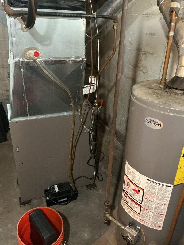 Responded to no cooling complaint on 26-year-old residential air conditioning system. Found unit locked out on low pressure safety switch. Bypassed low pressure switch to confirm diagnosis and verified system was significantly low on refrigerant charge using manifold gauges. Due to age of equipment and extent of refrigerant loss, provided repair options to customer and scheduled same-day estimate for complete system replacement.