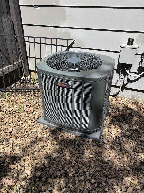 Completed annual cooling maintenance on one Trane condenser unit utilizing R-410A refrigerant. Performed comprehensive inspection including air filter, thermostat operation, temperature differential across evaporator coil, condenser coil condition, blower motor, capacitors, compressor amperage, refrigerant charge levels, and condensate drain line. All components tested within normal operating parameters with no deficiencies identified at time of service.