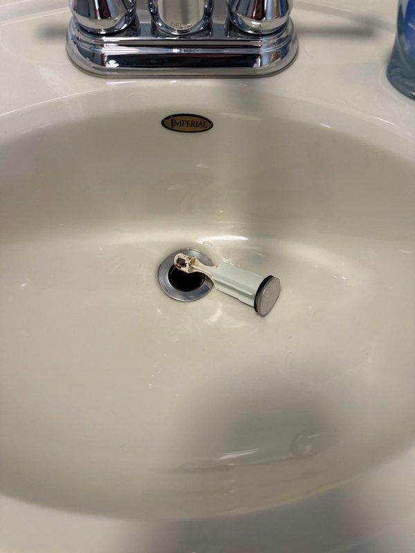 Installed new ADA-compliant comfort height toilet in men's restroom, including wax ring, mounting bolts, and complete fixture installation. Removed existing toilet and properly seated new unit to ensure proper seal and function. All components installed to manufacturer specifications and tested for proper operation.