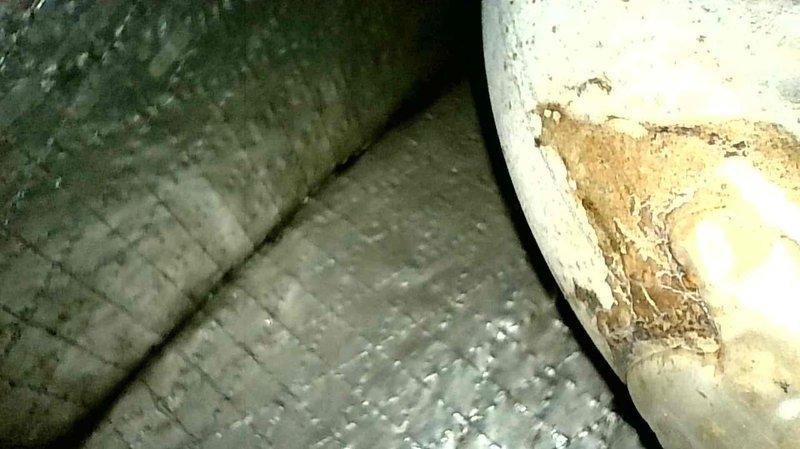 Responded to no heat call on 30+ year old furnace in residential system located in commercial property. Upon inspection, found blower motor operating with excessive noise and vibration causing unit to shake. Heat exchanger exhibited severe deterioration with visible cracking and material degradation, presenting safety concerns. Documented extensive damage to heat exchanger with photos showing significant rust, corrosion, and structural compromise. Due to age of equipment, critical condition of heat exchanger, and failed blower motor, recommended full system replacement over repair. Coordinated with sales team to provide replacement quote given unsafe operating conditions and cost-prohibitive nature of repairs on unit exceeding expected service life.