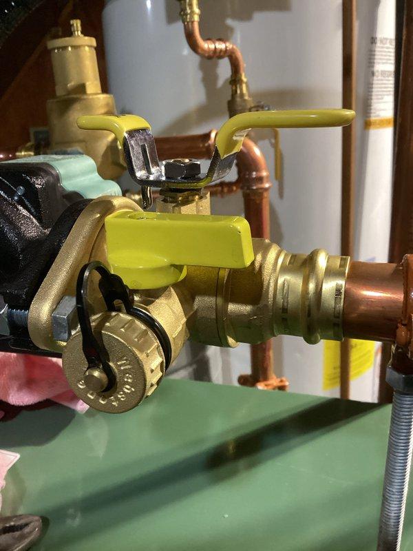 Responded to water leak on boiler installed in January. Upon inspection, identified loose brass fittings on ball valves connected to copper piping at the new installation. Tightened all compromised fittings and connections to restore proper seal and eliminate active leak.