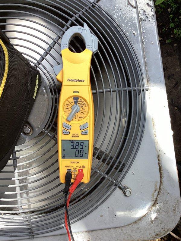 Completed comprehensive AC tune-up service on a 3-year-old residential air conditioning system. Performed thorough cleaning of outdoor condenser coil to ensure optimal heat transfer and system efficiency. Inspected air filter at indoor unit and confirmed clean condition requiring no replacement. Conducted complete electrical cabinet inspection including amperage measurements and connection verification, with all readings within normal operating parameters. System tested and confirmed operating properly with no deficiencies or concerns identified.