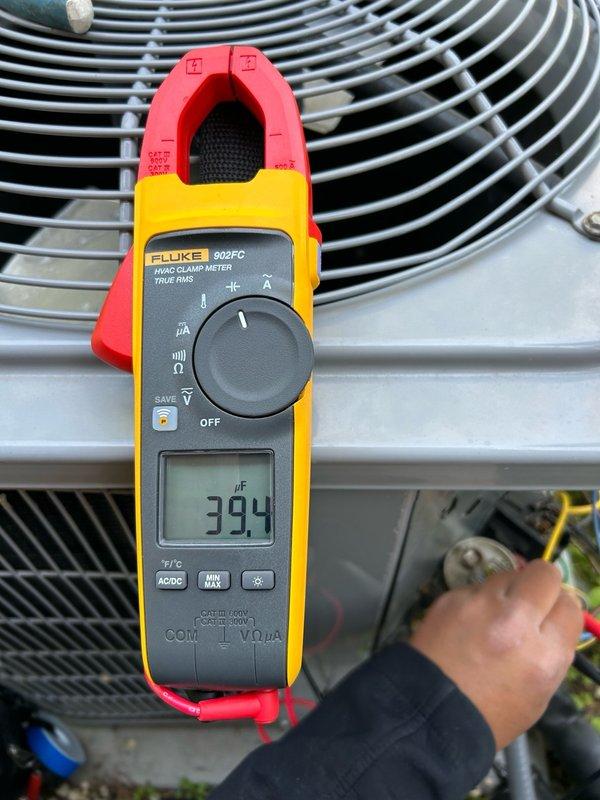 Completed comprehensive preventative maintenance on a 5-year-old residential air conditioning system. Performed full system inspection including thermostat operation verification, air filter assessment, blower assembly examination, and outdoor coil condition evaluation. Tested all electrical components, contactor, and capacitor—capacitance reading measured at 394 μF within normal operating parameters. Inspected condensate drain for proper function and evaluated refrigerant operation with temperature split measurements across the evaporator coil. All readings returned normal values with no mechanical deficiencies or safety concerns identified. System demonstrated proper cooling operation and performance consistent with manufacturer specifications. No repairs required at this time. Recommended continued seasonal maintenance to preserve system efficiency and monitor component wear as equipment ages.