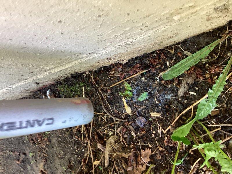 Performed annual cooling maintenance on 10-year-old residential air conditioning system. Verified supply air temperature at 22°F split, inspected attic-mounted air handler and noted absence of condensate overflow protection device. Flushed primary condensate drain line and confirmed proper drainage. Performed complete condenser unit inspection with all electrical components and refrigerant pressures reading within manufacturer specifications. Cleaned condenser coil, verified proper system operation, and completed all maintenance checklist items per membership agreement requirements.