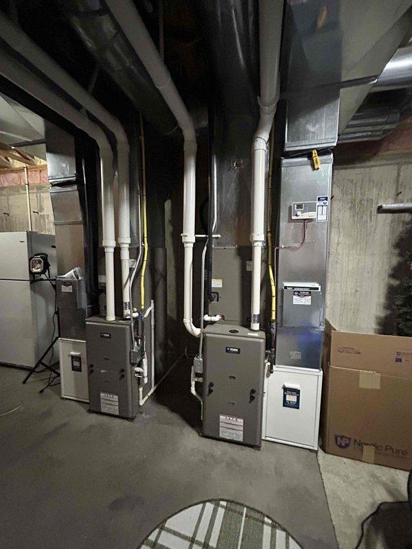 Performed comprehensive air conditioning tune-ups on two York brand condenser units located at the residence. Conducted thorough inspections of all components on both systems, including electrical connections, refrigerant levels, and operational controls. Both units demonstrated proper functionality with 20-degree temperature splits across the evaporator coils, indicating optimal cooling performance with no deficiencies identified.
