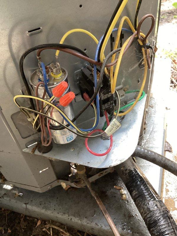 Performed routine maintenance tune-up on a 14-year-old Day & Night air conditioning condenser unit. System inspection revealed significant dirt accumulation affecting airflow and efficiency, requiring thorough cleaning of condenser coil and components. Electrical cabinet inspection identified an out-of-range capacitor that could cause compressor and fan motor failure, potentially resulting in no-cool condition. Replaced defective capacitor to restore proper electrical function and prevent system breakdown. Verified all electrical connections, refrigerant service ports, and operational components for proper function. System tested and returned to service with all components operating within normal parameters.