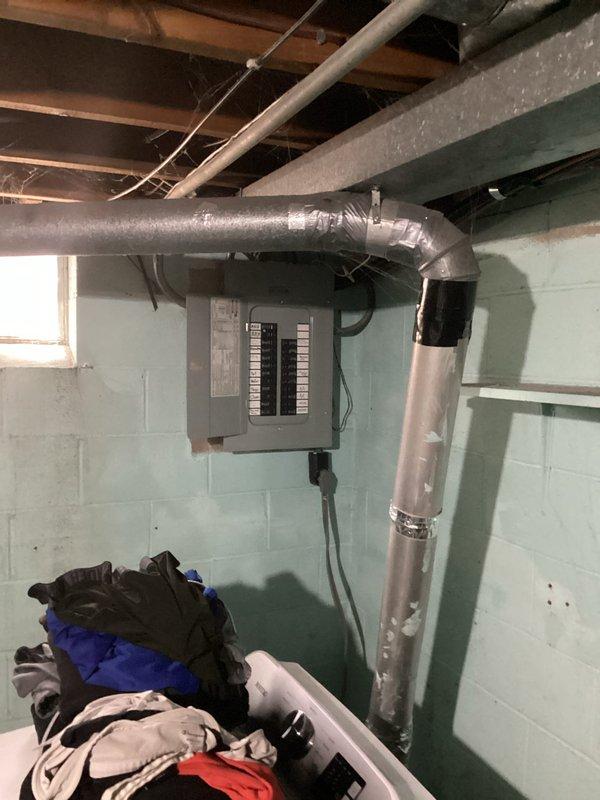 Performed routine maintenance tune-up on a 14-year-old Day & Night air conditioning condenser unit. System inspection revealed significant dirt accumulation affecting airflow and efficiency, requiring thorough cleaning of condenser coil and components. Electrical cabinet inspection identified an out-of-range capacitor that could cause compressor and fan motor failure, potentially resulting in no-cool condition. Replaced defective capacitor to restore proper electrical function and prevent system breakdown. Verified all electrical connections, refrigerant service ports, and operational components for proper function. System tested and returned to service with all components operating within normal parameters.