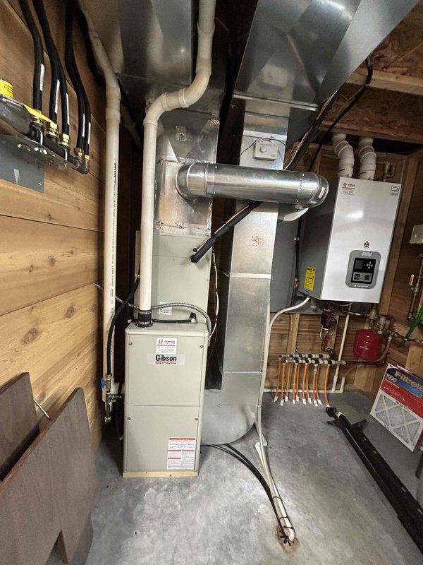 Completed Family Rewards member air conditioning tune-up on front unit. Performed comprehensive system inspection with all electrical components testing within normal parameters. Removed and cleaned condenser top cover, thoroughly rinsing interior and exterior coils. Cleared condensate drain line and verified pan was free of obstructions. Noted no evidence of rodent intrusion in condenser unit this season. Confirmed air filter had been recently replaced by homeowner. Measured supply and return air temperatures with system operating at 17° temperature differential, indicating proper cooling performance. All components functioning as designed with no issues identified.