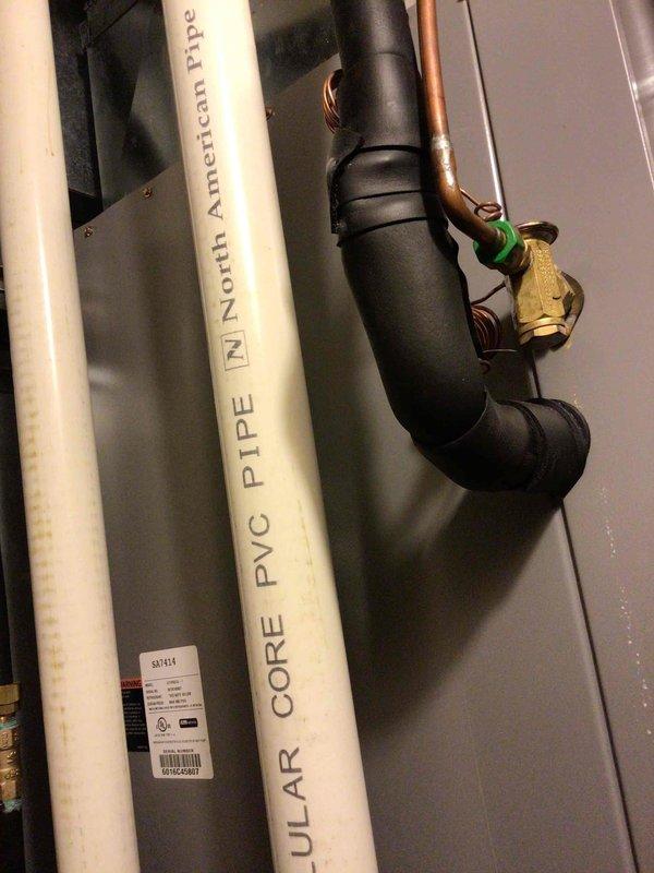 Responded to no cooling complaint on system with thermostat installed in November. Verified thermostat settings and provided operational instruction on basic functions. Diagnosed system tripped on low pressure safety due to complete refrigerant loss from leaking evaporator coil. Documented conditions with photos showing mold growth on wooden trim and corroded metal surfaces indicating moisture issues related to the failing coil. Prepared estimate for evaporator coil replacement to restore system operation.