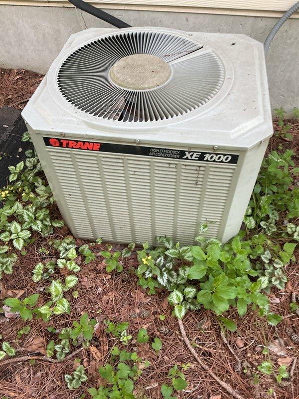 Performed routine AC maintenance tune-up on Trane XE 1000 condenser unit utilizing R22 refrigerant. Identified system freezing issue caused by pitted contactor that was burning the 24-volt control wiring. Replaced failed contactor, repaired damaged low-voltage wiring, and completed full system inspection with borescope documentation of internal components to restore proper cooling operation.