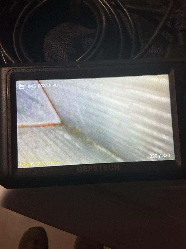 Performed routine AC maintenance tune-up on Trane XE 1000 condenser unit utilizing R22 refrigerant. Identified system freezing issue caused by pitted contactor that was burning the 24-volt control wiring. Replaced failed contactor, repaired damaged low-voltage wiring, and completed full system inspection with borescope documentation of internal components to restore proper cooling operation.