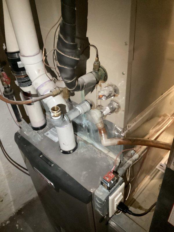 Completed annual cooling maintenance visit on 26-year-old AC system. Upon arrival, customer reported system was not running and potentially inoperative. Inspection revealed faulty wiring at the indoor equipment control board causing electrical shorting. Rewired connections, tightened all terminal block connections, and restored system to operational status. Performed standard tune-up procedures and verified mini-split units are functioning properly. Customer expressed interest in replacement system options given the age of existing equipment.