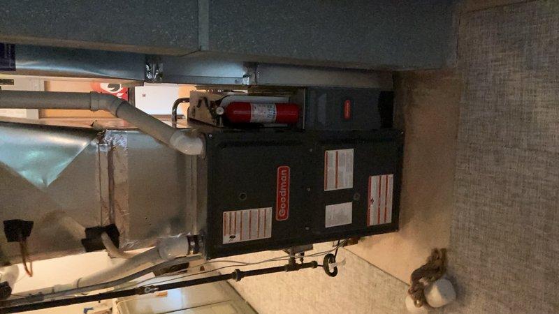 Performed preventive maintenance on a 5-year-old residential air conditioning system that failed to start due to excessive debris accumulation. The outdoor condenser unit, located near a park area, had significant buildup of leaves and cottonwood material restricting airflow through the coil and louvers. Thoroughly cleaned the exterior condenser unit, removing all organic debris from the coil fins, cabinet, and protective grille. Inspected all electrical components, refrigerant lines, and mechanical systems to ensure proper operation. After cleaning and component verification, successfully restored system functionality and confirmed normal startup and operation of both the outdoor condenser and indoor air handler units.