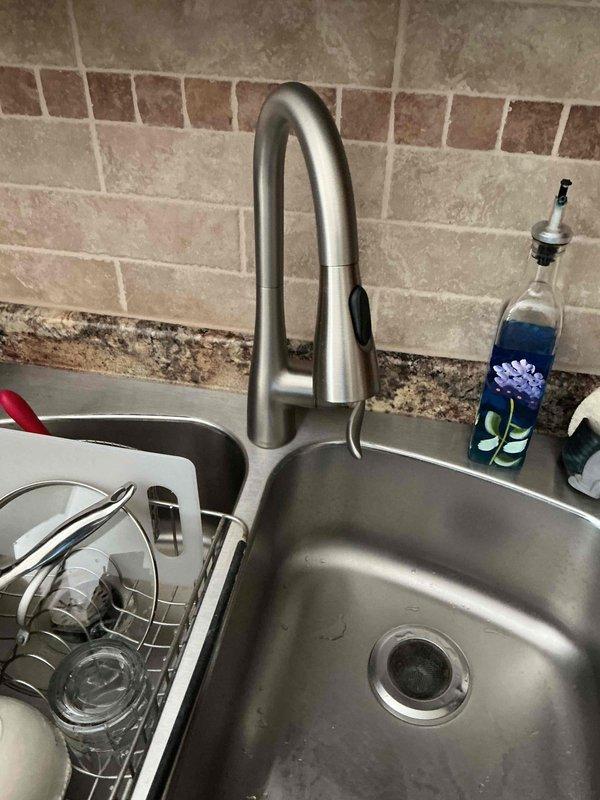 Completed comprehensive plumbing inspection of residential property as part of recurring maintenance service. Inspected kitchen plumbing fixtures including double-basin stainless steel sink with pull-down faucet, verified proper drainage and water flow, and examined visible supply lines and connections. All plumbing systems found to be in proper working order with no leaks or deficiencies identified.