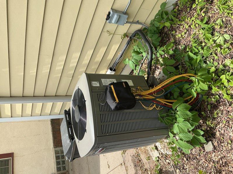 Responded to no cooling call on 2024-installed heat pump system displaying overheat error codes and continuous shutdowns. Upon arrival, confirmed outdoor fan operation but no cooling output despite recently changed filter. Performed diagnostic testing on R410-A system and identified low refrigerant charge as primary issue. Conducted thorough inspection of evaporator coils for potential leak sources; coils showed no visible damage or leak indicators. Checked refrigerant levels and documented system pressures for further evaluation and refrigerant recharge recommendation.