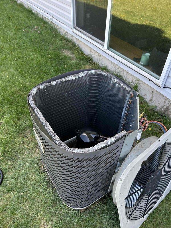 Completed comprehensive air conditioning tune-up on 19-year-old system. Removed condenser top panel and thoroughly rinsed condenser coil inside and out to remove debris and improve heat transfer efficiency. Performed full system diagnostics with all electrical and mechanical components testing within normal operating parameters. Cleared and treated condensate drain line to ensure proper drainage. Verified system performance with 20-degree temperature differential across evaporator coil, confirming optimal cooling capacity and refrigerant charge.