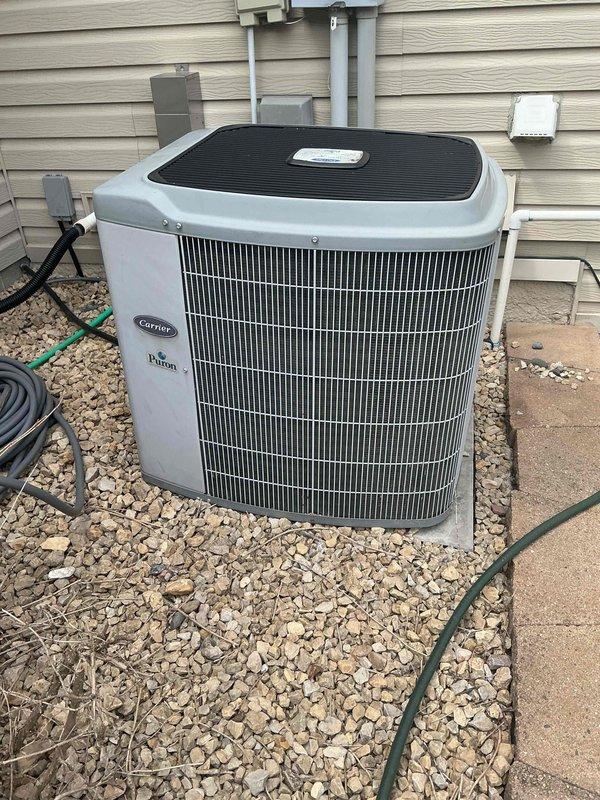 Responded to no cooling complaint on 22-year-old Carrier Infinity system. Diagnosed system low on refrigerant charge by approximately 3 pounds (factory charge 7 pounds). Found failed contactor with visible burn marks drawing high amperage despite reduced system load. Verified condenser airflow adequate and unobstructed across coil. Due to age of equipment and extent of repairs needed, discussed replacement options with homeowner and coordinated service advisor appointment for new system estimates.