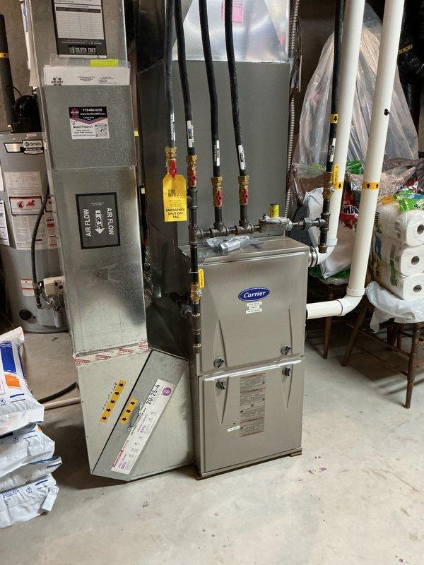 Performed comprehensive preventive maintenance tune-up on Lennox EL18XCVS036 air conditioning system. Removed condenser panels and thoroughly rinsed coil assembly to ensure optimal heat transfer efficiency. Conducted complete electrical inspection including voltage, amperage, and connection integrity—all components found within manufacturer specifications. Verified indoor air filter condition, inspected evaporator drain line for proper drainage flow, and confirmed system startup with proper operation achieving 20-degree temperature split across the coil.