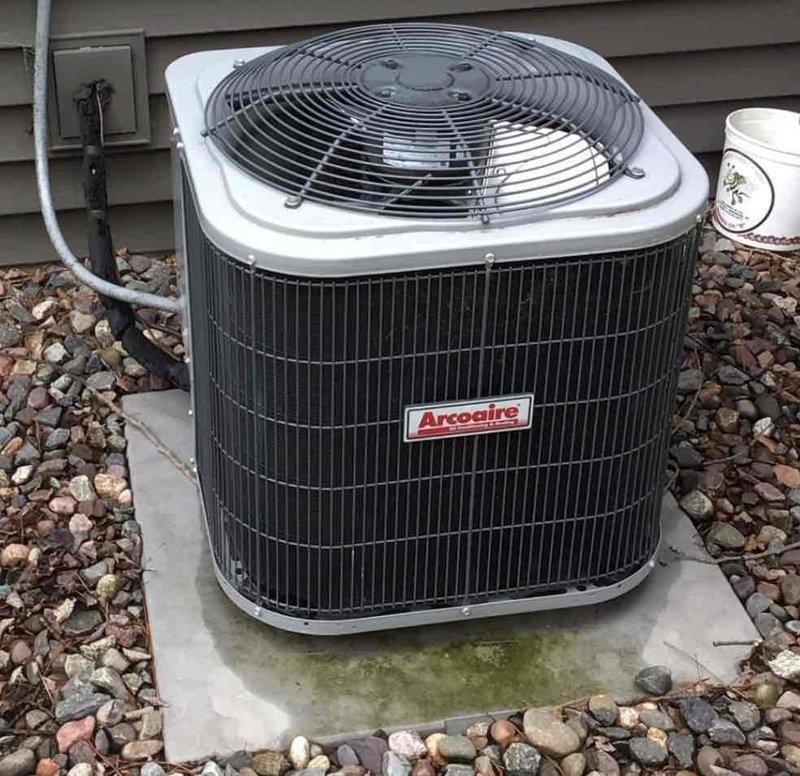 Performed comprehensive annual maintenance on 5-year-old Arcoaire HVAC system including outdoor condenser unit and indoor furnace. Cleaned outdoor condenser coils and fins, removed debris from unit perimeter, inspected electrical connections at disconnect box, and verified proper conduit routing. Tested all system components including compressor operation, fan motor function, refrigerant pressures, and electrical controls. Verified indoor furnace operation, checked air filter specifications (16x25x1), inspected PVC condensate drainage lines, and tested safety controls. All equipment operating within manufacturer specifications with no issues identified.
