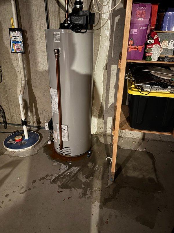 Responded to service call for water heater producing insufficient hot water and leaking from bottom of unit. Upon inspection, determined existing tanked water heater had failed and was actively leaking at base, creating moisture on basement floor. Removed and disposed of failed unit. Installed new 50-gallon natural gas power vent water heater with Energy Star certification. Connected all copper supply lines, gas line, and PVC vent piping. Installed circulation pump and necessary valves. Tested all connections for leaks, verified proper venting, and confirmed unit operation with adequate hot water production throughout home.