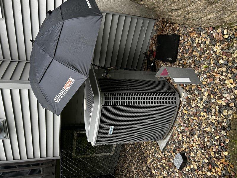 Performed comprehensive air conditioning tune-up and system evaluation. Tested AC operation under ambient conditions, verified clean air filter, cleared condensate drain line, and measured 17° temperature differential across the evaporator coil. Inspected blower assembly for proper operation. Cleaned outdoor condenser coil and performed component inspection, identifying pitted contactor and weakening capacitor on compressor circuit. Provided recommendations for capacitor and contactor replacement to ensure continued reliable operation.