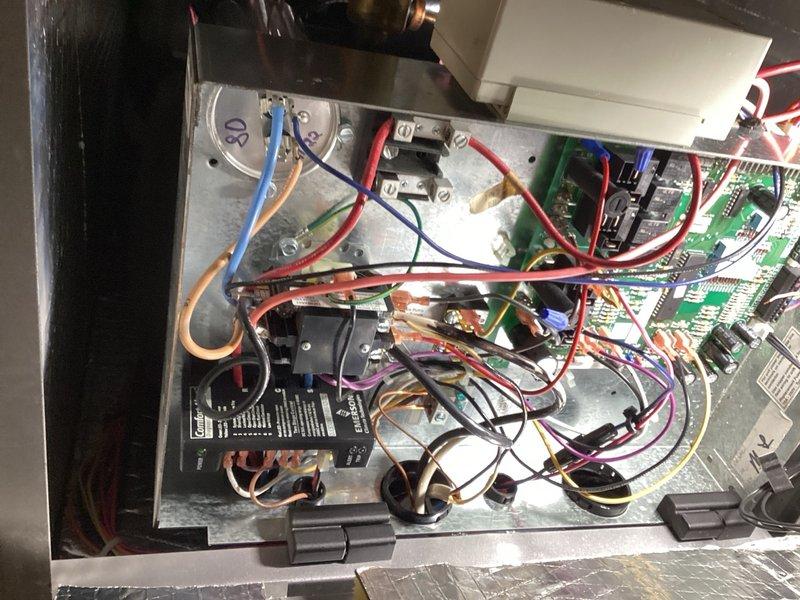 Responded to service call for geothermal system displaying error messages on both thermostats. Performed diagnostic inspection of geothermal heat pump, system controller, and furnace components. Testing revealed furnace blower not operating despite power supply being present at unit. Conducted voltage and signal testing at blower ECM motor, confirming electrical power delivery but no motor response. Determined blower ECM motor failure as root cause of system malfunction. Documented findings with photographic evidence of equipment and control panel. Completed parts order requisition for replacement blower ECM motor and scheduled follow-up appointment for installation.
