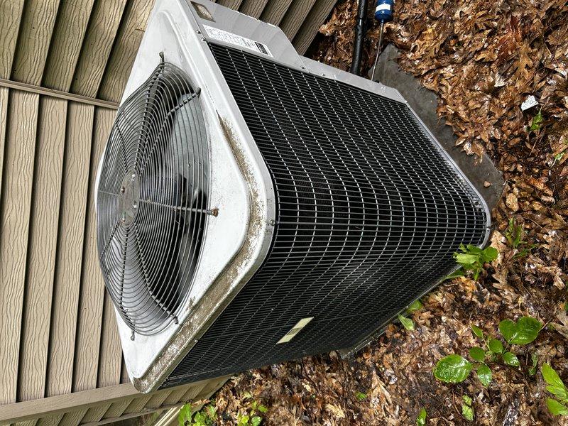 Performed preventative maintenance tune-up on 2011 residential AC unit. Inspected and replaced air filter, cleared condensate drain line, and power-washed outdoor condenser coil to remove accumulated debris. Performed visual inspection of electrical components and connections at condenser unit. Due to inclement weather conditions, refrigerant pressure testing was not performed. Verified system operation with temperature differential testing across evaporator coil, confirming proper cooling performance and airflow throughout the system.