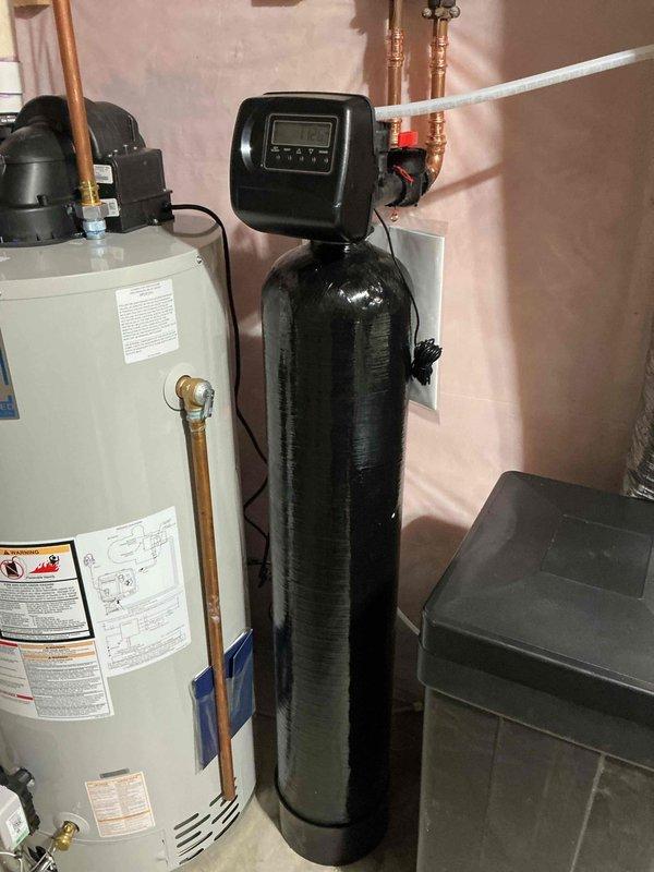 Responded to service call for non-functioning garbage disposal and squeaking toilet. Upon inspection, found existing garbage disposal had rusted through the housing, causing water leakage into the cabinet below and rendering the unit completely inoperational. Removed failed disposal unit and installed new replacement garbage disposal, ensuring proper mounting, electrical connections, and drain plumbing. Tested new unit for proper operation and verified no leaks present. Also addressed squeaking toilet issue during visit.