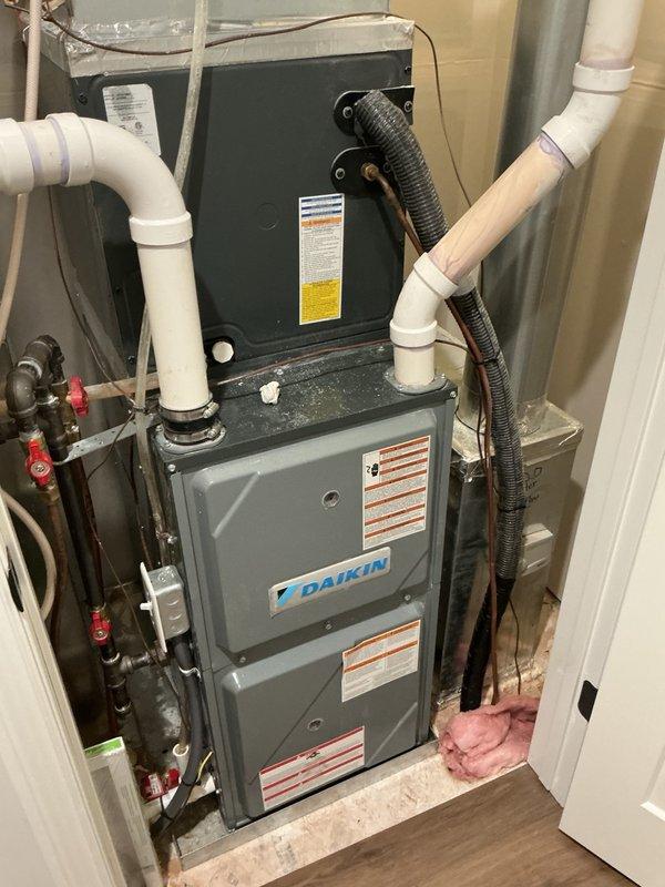 Responded to complaint of loud humming noise from furnace during operation. Diagnosed issue as humidifier solenoid running dry due to closed water supply valve. Opened water shut-off valve to humidifier, restoring water flow and eliminating excessive noise. Identified small leak at solenoid hose connection, disassembled fitting, replaced worn bushing, and reassembled connection. Verified leak repair, confirmed humidifier operating quietly with proper water flow, and ensured system functioning normally.