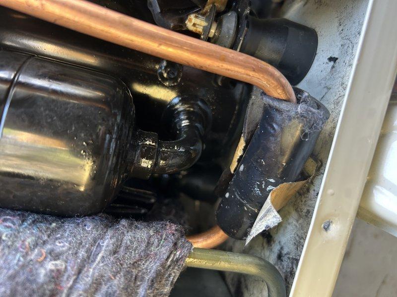 Responded to service call for mini-split system requiring refrigerant recharge. Upon arrival, repaired flare connections and performed pressure test on the system. During testing, audible leak detected from inside the unit. Further inspection revealed a cracked compressor requiring replacement. Documented findings with photographic evidence and informed customer of the failed component. Coordinated with technical support to obtain replacement compressor part number and warranty claim documentation. Determined that equipment registration was incomplete and required original installation company information to process warranty claim. Customer agreed to obtain necessary installation details from previous property owner to complete equipment registration. Once registration information is received, warranty process will proceed through authorized dealer for compressor replacement under manufacturer warranty.