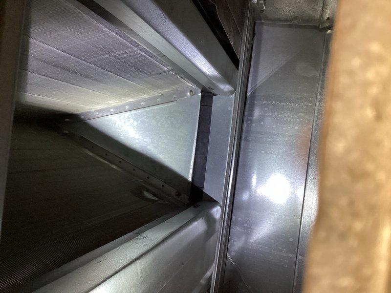 Performed comprehensive AC tune-up and inspection on 15-year-old system for new homeowner. Inspected all routine components including filter, blower motor, and evaporator coil, finding all clean with proper condensate drainage. Conducted electrical testing on outdoor unit, cleaned condenser coils, and verified system operation with 15-minute runtime test, confirming 17-18 degree temperature split despite low ambient load of 60 degrees, indicating optimal cooling performance.