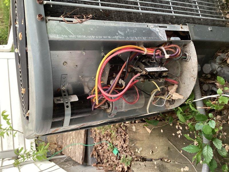 Completed comprehensive furnace and AC tune-ups on 20+ year old system. Furnace inspection revealed heavily soiled air filter and excessive play in blower wheel assembly; all electrical readings within manufacturer specifications and heat exchanger showed no cracks or compromises. System achieved 55-65°F temperature rise during operational testing. AC inspection of R22 system identified capacitor reading out of specification on hermetic compressor side and contactor showing significant pitting. Unit produced approximately 20°F temperature drop during cooling cycle testing. Documented findings with photographic evidence showing outdoor condensing unit with exposed electrical components and indoor equipment installation. Recommended system evaluation for repair estimates given age of equipment and identified component deficiencies. Follow-up appointment scheduled for replacement pricing consultation.