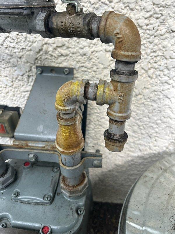 Responded to a no-heat emergency call where both heating and air conditioning systems were inoperative due to a gas supply issue affecting the entire residence. Upon arrival, confirmed that the utility company had previously identified multiple leaking connections on the gas line between the meter and the exterior wall penetration. Inspected the corroded gas piping system and identified compromised fittings showing significant weathering and deterioration. Removed and replaced all defective fittings and connections on the exterior gas line assembly. Performed comprehensive leak check on all replaced fittings and reconnections using pressure testing equipment to verify system integrity. Coordinated with the utility company for gas service restoration and final inspection. The gas company restored service and conducted their own leak verification. Confirmed all gas appliances and HVAC equipment returned to normal operation with proper gas supply restored throughout the home.