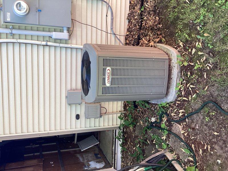 Completed annual air conditioning maintenance tune-up on Lennox outdoor condensing unit. Performed comprehensive system inspection including cleaning of outdoor coil, inspection of electrical components, refrigerant pressures, and routine operational checks—all parameters found within manufacturer specifications. Replaced heavily soiled air filter and conducted operational test with 15-minute runtime, confirming proper system performance with 15-degree temperature split across evaporator coil.