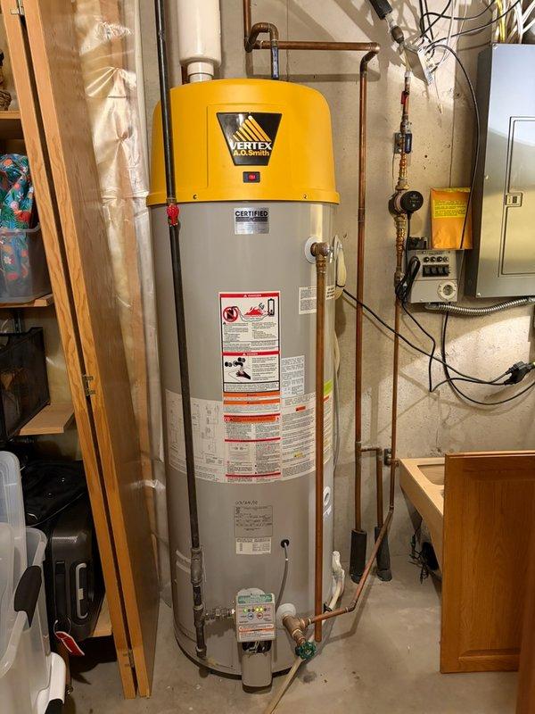 Responded to a no hot water condition on a Vertex by A.O. Smith tanked water heater displaying an ignition/flame failure error code. Upon inspection, diagnosed a faulty flame sensor preventing proper ignition. Performed cleaning and maintenance on the burner assembly and thermocouple to restore proper operation. Unit tested successfully and returned to normal hot water production.