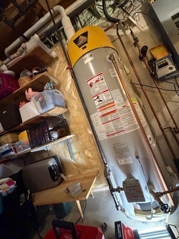 Responded to a no hot water condition on a Vertex by A.O. Smith tanked water heater displaying an ignition/flame failure error code. Upon inspection, diagnosed a faulty flame sensor preventing proper ignition. Performed cleaning and maintenance on the burner assembly and thermocouple to restore proper operation. Unit tested successfully and returned to normal hot water production.