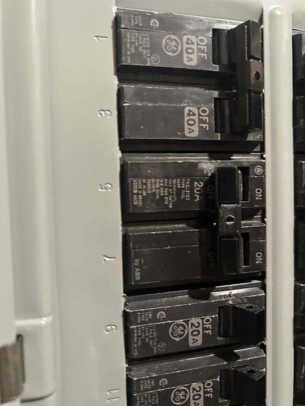 Responded to no-cooling complaint on recently installed system. Upon arrival, found AC breaker tripped; attempted reset but breaker immediately re-tripped. Verified all field wiring connections were correct and disconnected high voltage from equipment, but breaker continued to fail reset. Determined issue to be electrical panel/breaker malfunction rather than HVAC equipment problem. Left outdoor disconnect off and thermostat in off position for safety. Submitted follow-up request for licensed electrician to diagnose and replace faulty breaker before system can be restored to operation.