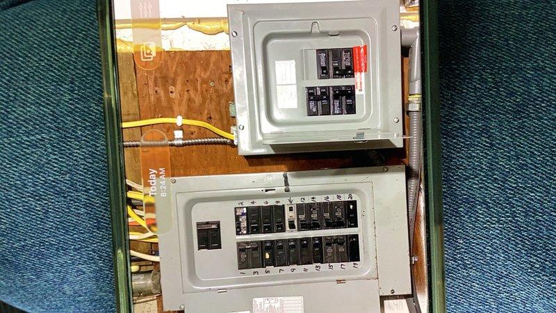 Responded to no-cooling call on mini-split system installed last fall during first seasonal startup attempt. Unit was unresponsive to remote control commands. Verified circuit breaker at main panel was not tripped and appeared to be in normal operating position. Performed voltage testing at outdoor disconnect and measured 120V from each leg to ground but 0V across the legs, indicating loss of one phase of 240V power supply. Diagnosed issue as faulty circuit breaker in main electrical panel rather than equipment malfunction. Confirmed mini-split installation was not the cause of the electrical supply failure. Advised homeowner of findings and recommended scheduling licensed electrician to diagnose and replace defective breaker to restore proper 240V power to unit.