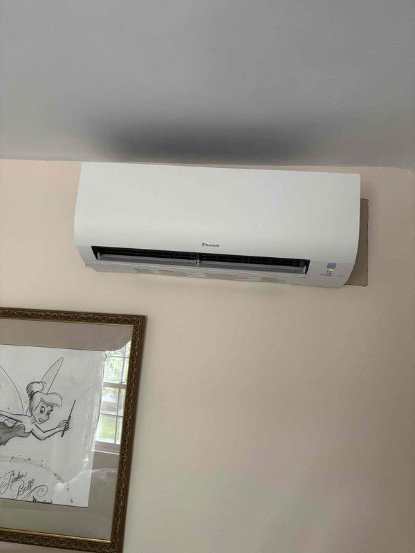Responded to no cooling complaint on recently installed Daikin mini-split system with three indoor head units. Upon arrival, system was not responding to cooling calls and indoor units were inoperative. Suspected error code present but unable to retrieve from indoor unit display. Proceeded to outdoor unit and performed system reset, which successfully cleared the error code. Cycled all three indoor head units through multiple cooling cycles to verify proper operation. Measured temperature split at supply vents, confirming adequate cooling performance. All zones now operating normally with proper airflow and refrigerant operation restored.