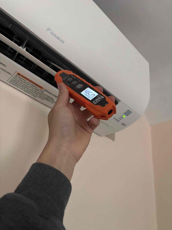 Responded to no cooling complaint on recently installed Daikin mini-split system with three indoor head units. Upon arrival, system was not responding to cooling calls and indoor units were inoperative. Suspected error code present but unable to retrieve from indoor unit display. Proceeded to outdoor unit and performed system reset, which successfully cleared the error code. Cycled all three indoor head units through multiple cooling cycles to verify proper operation. Measured temperature split at supply vents, confirming adequate cooling performance. All zones now operating normally with proper airflow and refrigerant operation restored.