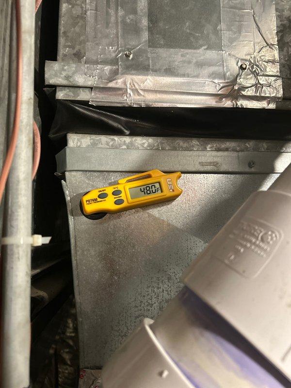 Completed scheduled AC maintenance tune-up on residential cooling system. System operating properly with adequate cooling performance. During inspection, identified a Schrader valve with slow refrigerant leak; UV dye previously present in system noted. Presented repair options to address the leaking Schrader valve. All other components inspected and found in satisfactory condition with no additional concerns.