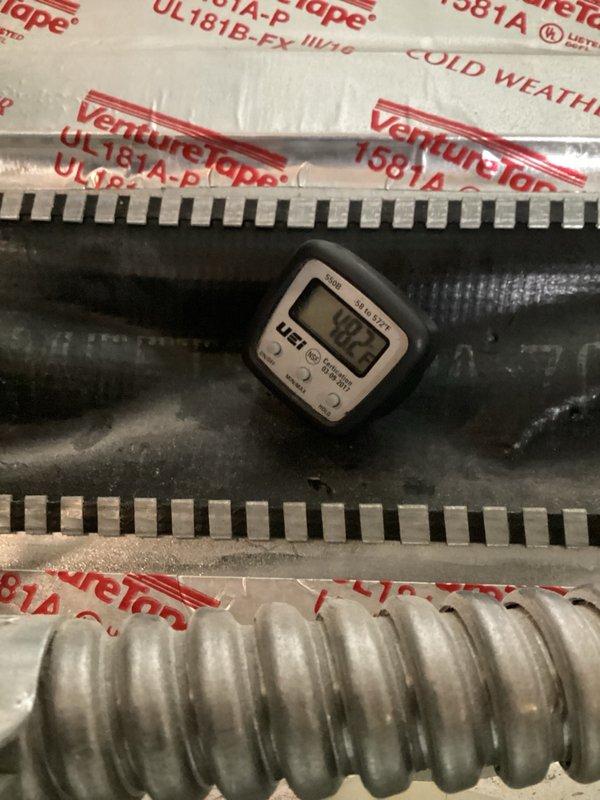 Completed AC tuneup on Magic Pak system. Filter was recently changed and in good condition. Blower motor capacitor tested at 6.77 MFD, which is below manufacturer recommended range of 7.5 MFD; homeowner requested capacitor replacement be scheduled for fall service along with humidifier canister replacement. Condenser coil showed minor buildup; homeowner declined cleaning at this time and will address after cottonwood season. System temperatures and operation verified. Honeywell humidifier canister replacement needed and noted on file for fall visit.